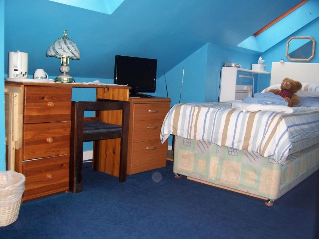 Postel nebo postele na pokoji v ubytování Sunnyside B&B