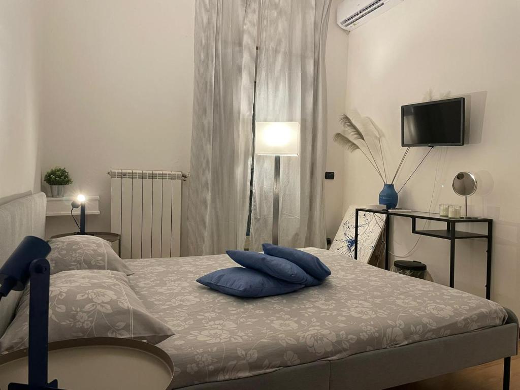 Posteľ alebo postele v izbe v ubytovaní Ventoblu in Centro Napoli