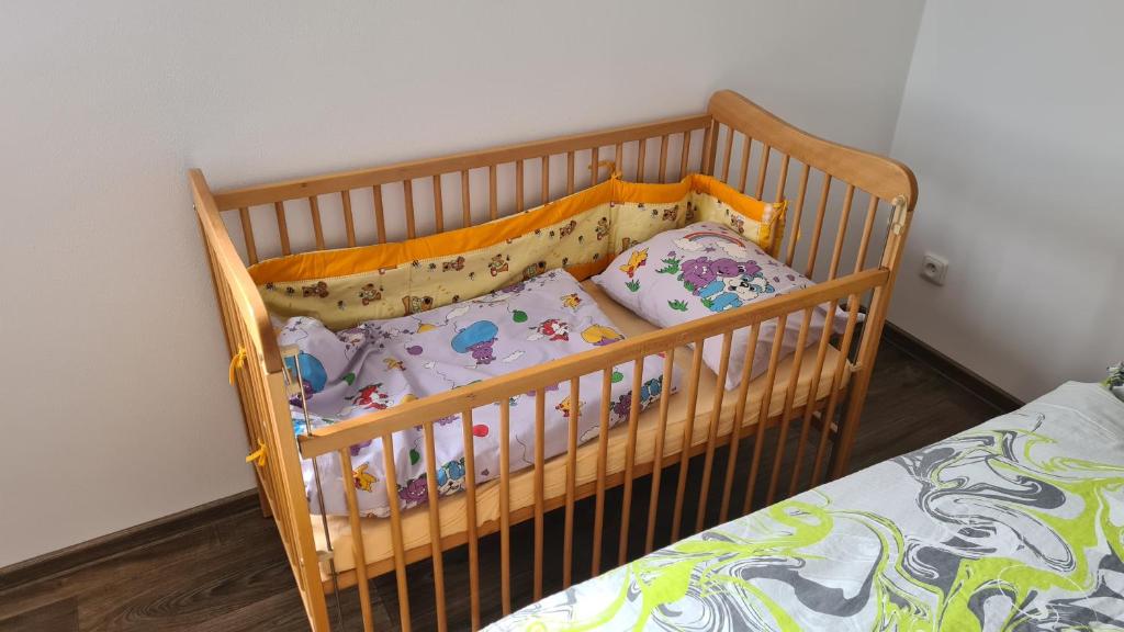 Postel nebo postele na pokoji v ubytování Apartmán Malá Valaška