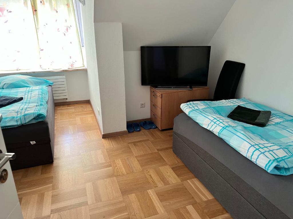 Postel nebo postele na pokoji v ubytování Guesthouse David