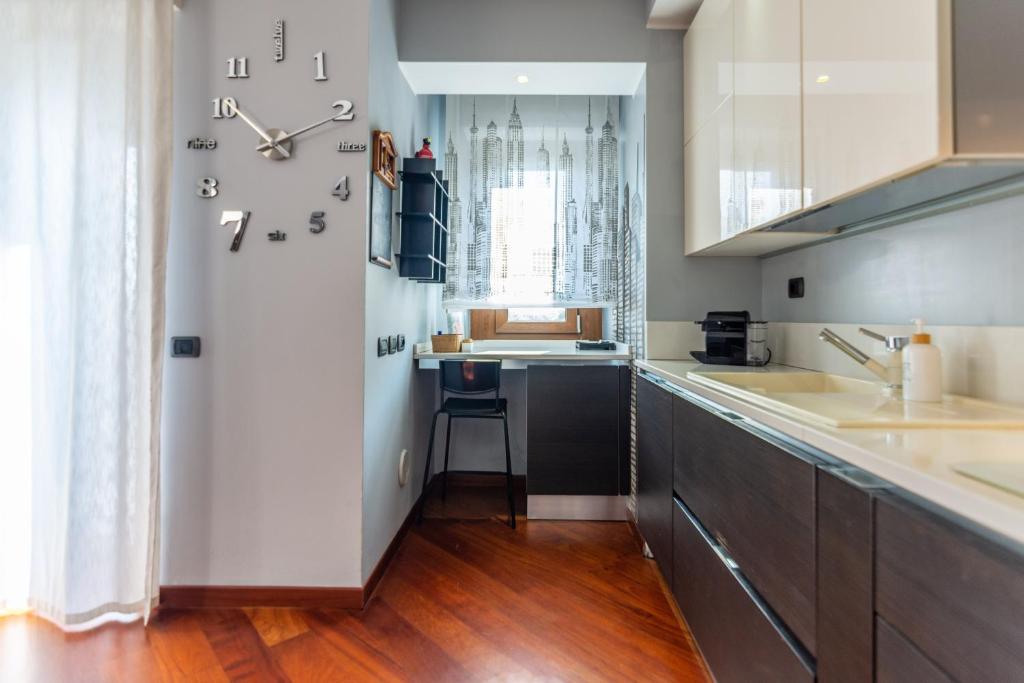 Kuchyň nebo kuchyňský kout v ubytování Assago amazing flat