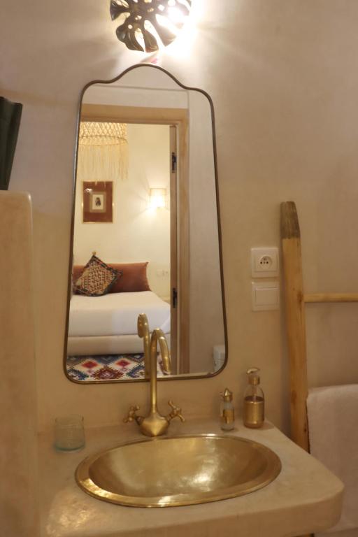 Postelja oz. postelje v sobi nastanitve Riad NaaNaa Bed & Breakfast