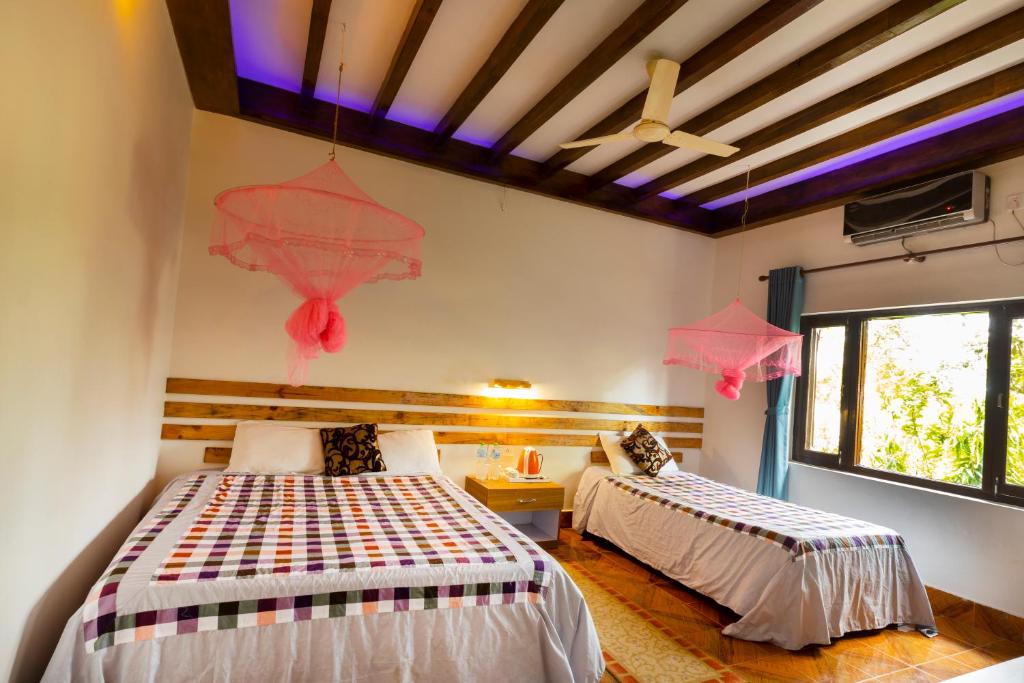 Letto o letti in una camera di Hotel Parkside & Swimming Pool-Between Greenery and Azure ,Your Perfect Retreat