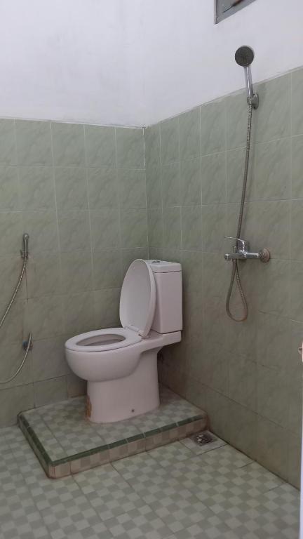 Koupelna v ubytování Hotel Tentrem Syariah