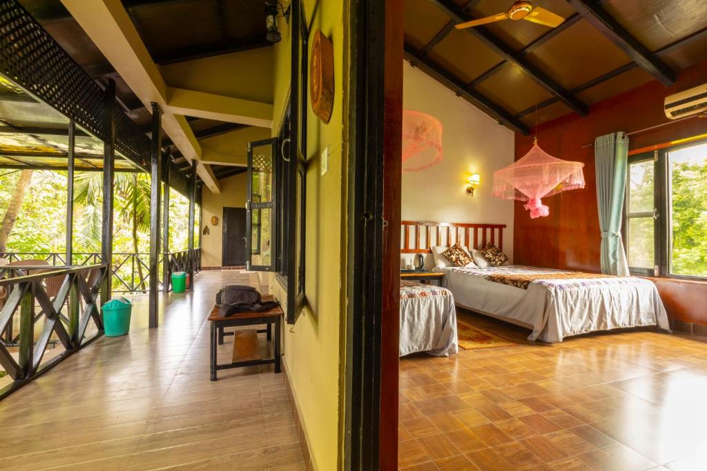 Letto o letti in una camera di Hotel Parkside & Swimming Pool-Between Greenery and Azure ,Your Perfect Retreat