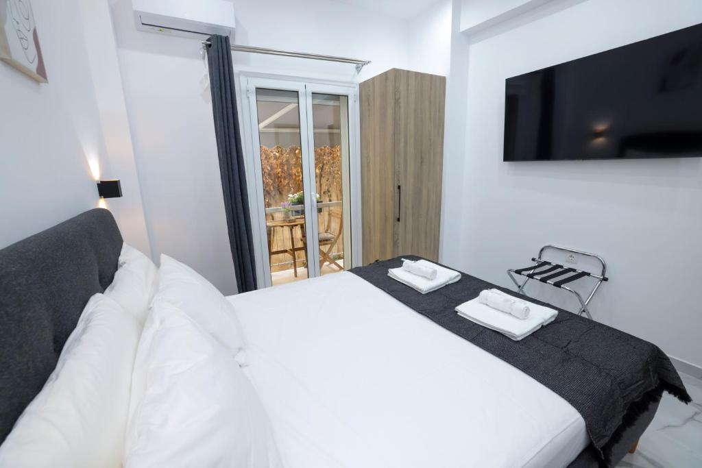 Postel nebo postele na pokoji v ubytování Apollo 2 bd Jacuzzi Suite