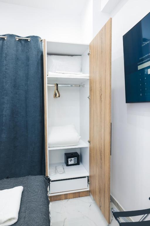 TV a/nebo společenská místnost v ubytování Apollo 2 bd Jacuzzi Suite