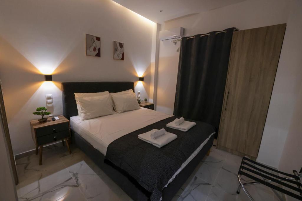 Postel nebo postele na pokoji v ubytování Apollo 2 bd Jacuzzi Suite