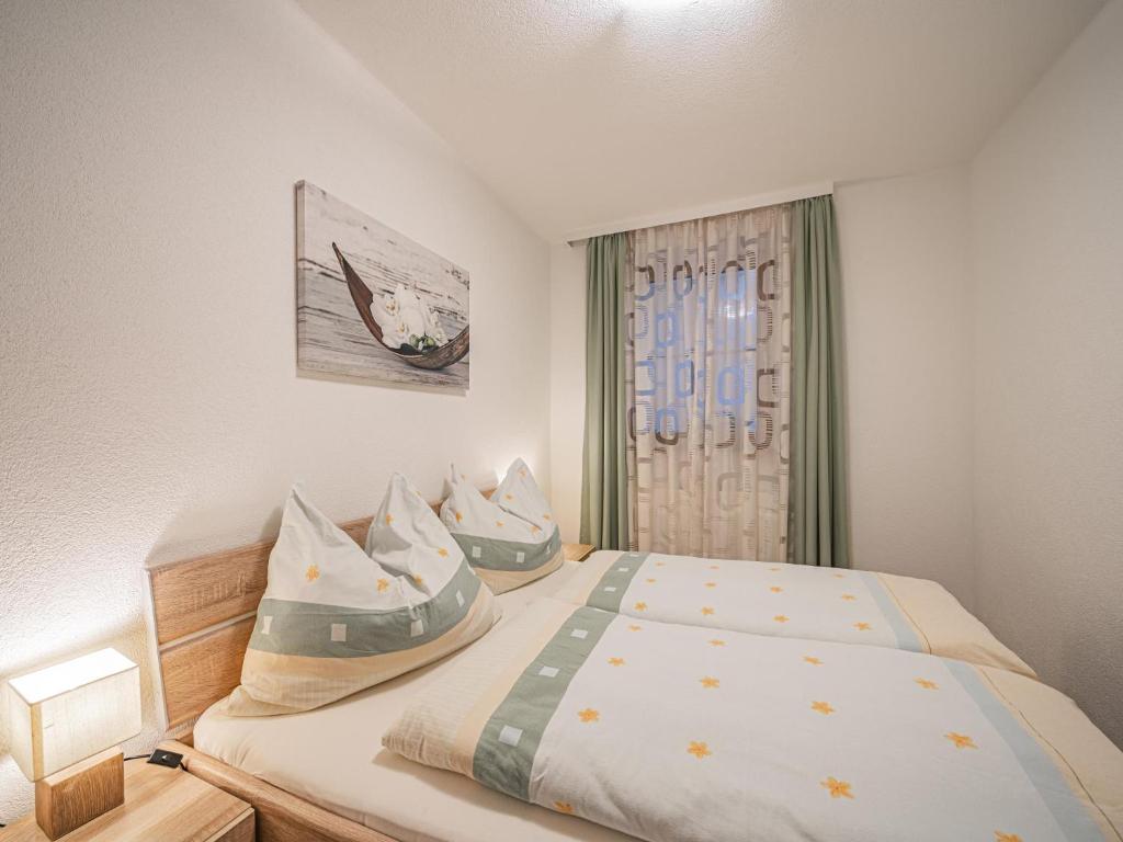 Postel nebo postele na pokoji v ubytování Kapeller