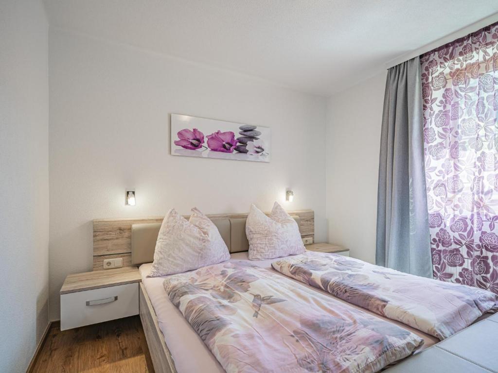 Postel nebo postele na pokoji v ubytování Kapeller