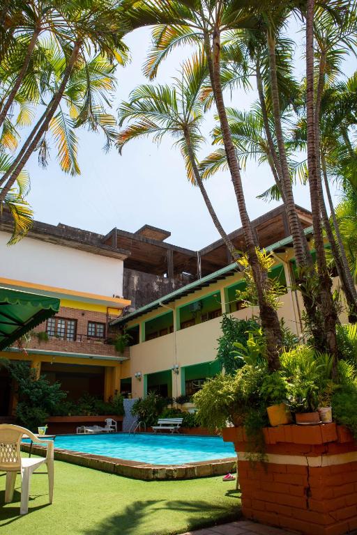 Bazén v ubytování Hotel Santo Domingo nebo v jeho okolí