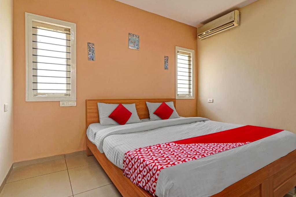 Postel nebo postele na pokoji v ubytování Super Hotel O Indra Suites