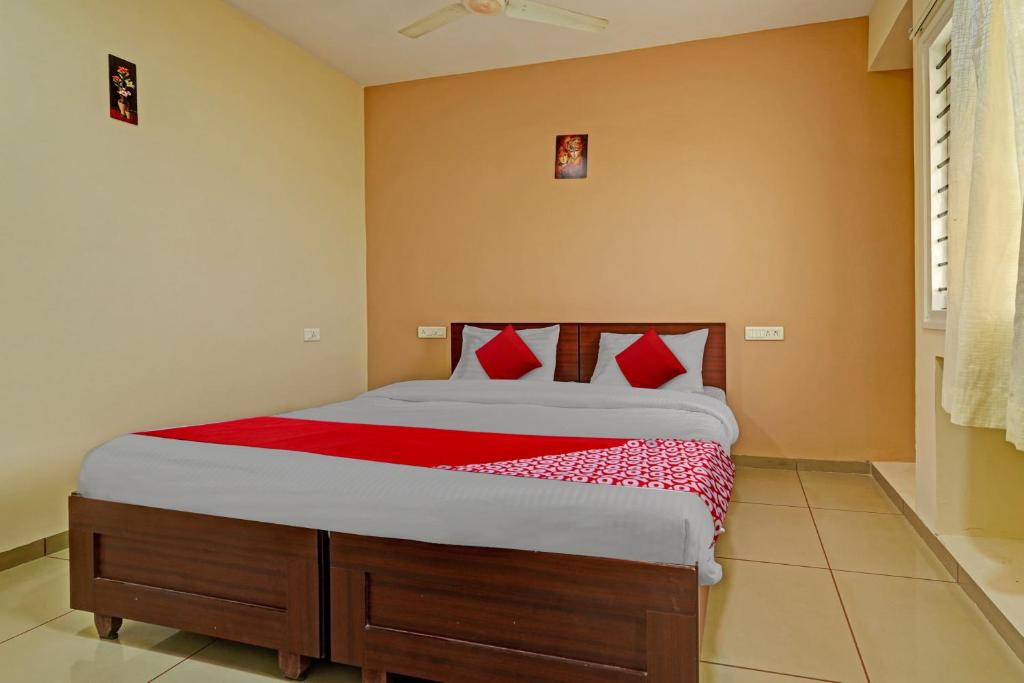Postel nebo postele na pokoji v ubytování Super Hotel O Indra Suites