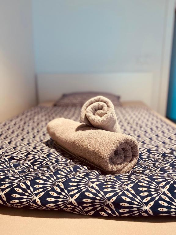 Postel nebo postele na pokoji v ubytování VOO residence