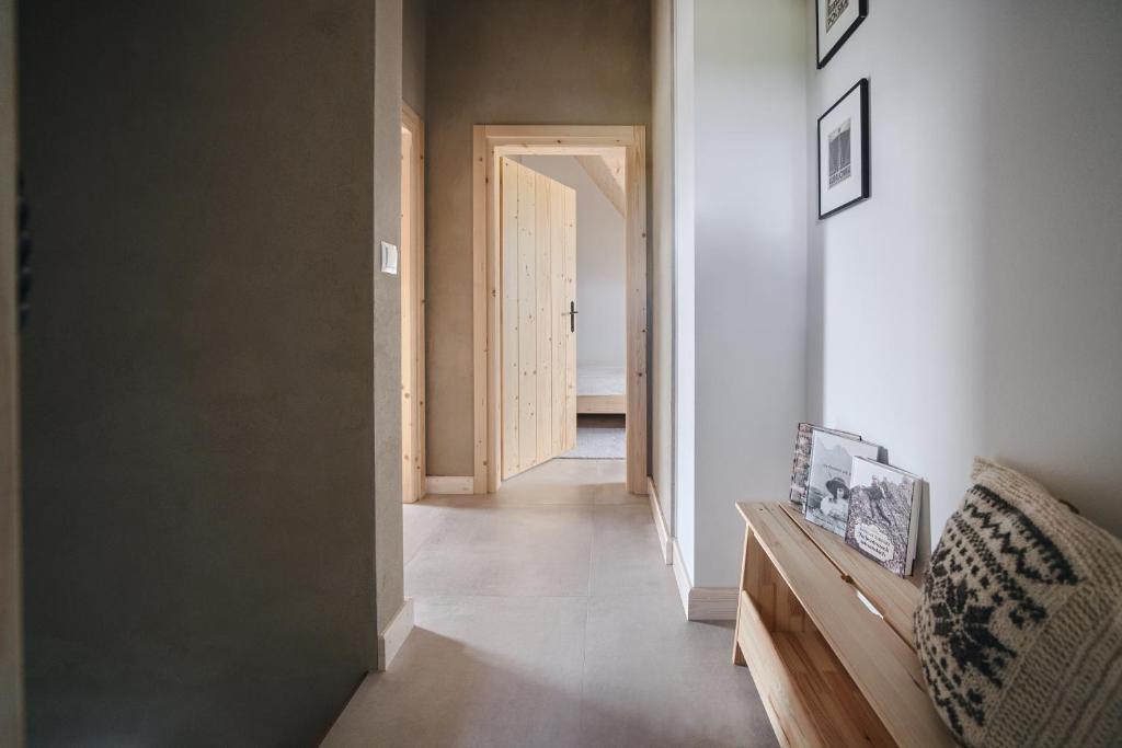 Posteľ alebo postele v izbe v ubytovaní Apartamenty Przystanek Grapa