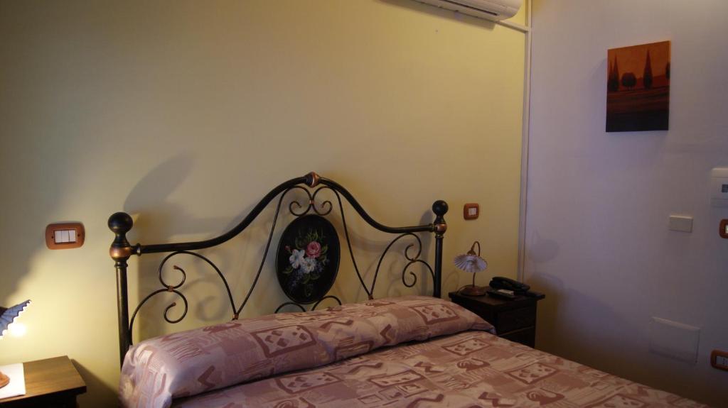 Posteľ alebo postele v izbe v ubytovaní Agriturismo La Colombaia