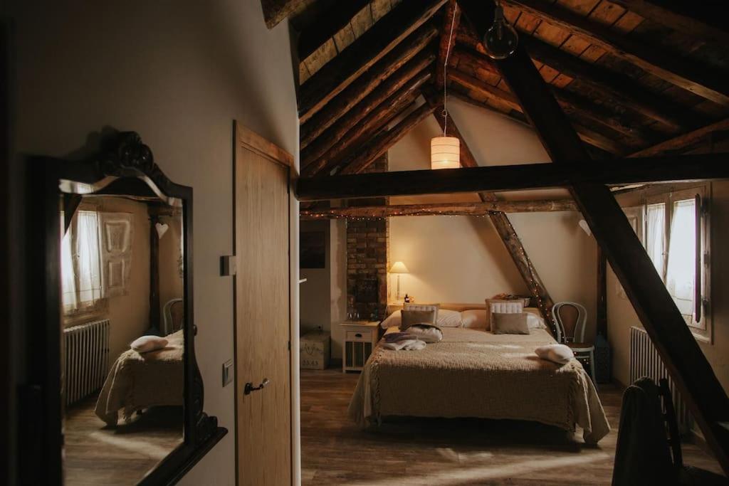Postel nebo postele na pokoji v ubytování Casa Rural Valle de Tena