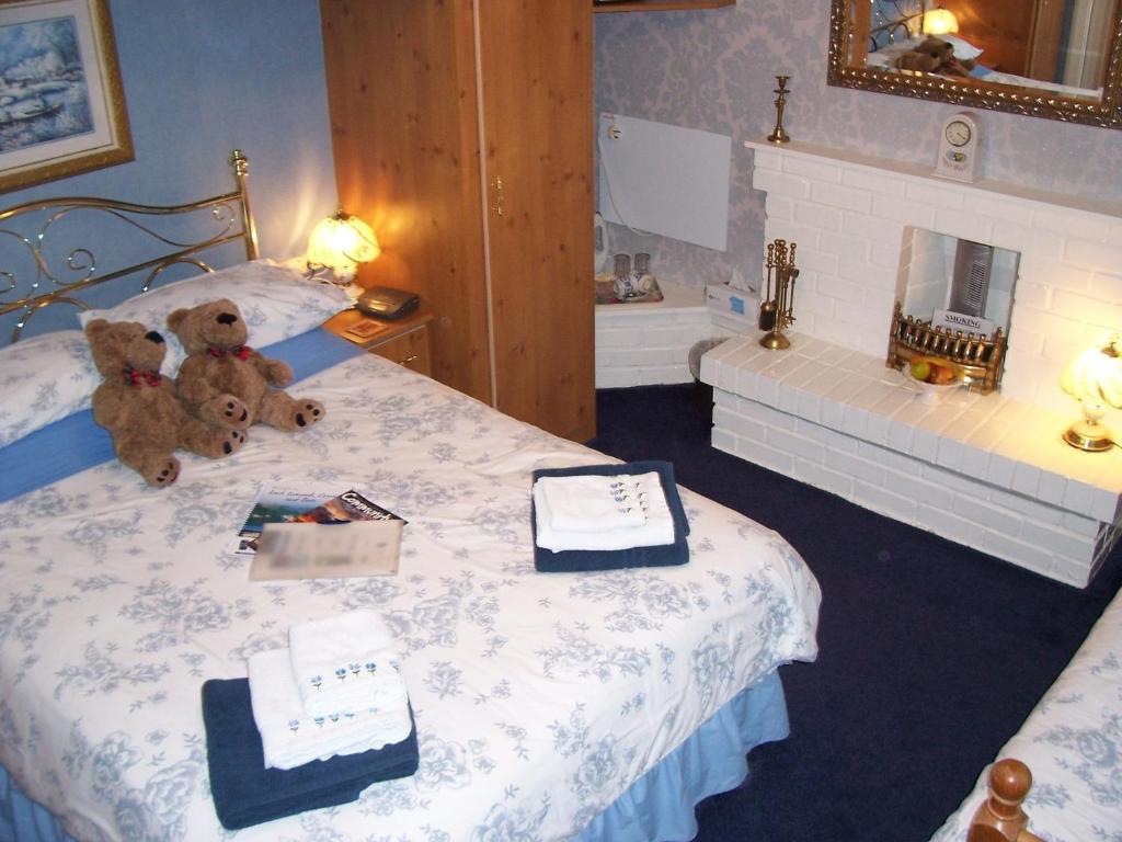 Postel nebo postele na pokoji v ubytování Sunnyside B&B