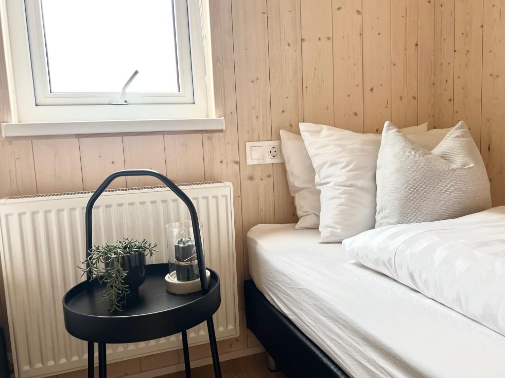 Postel nebo postele na pokoji v ubytování REY Stays - House