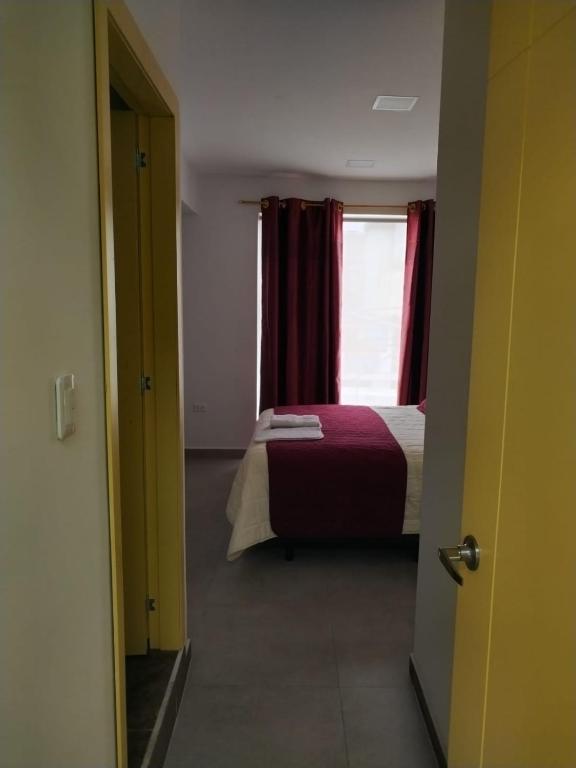 Postel nebo postele na pokoji v ubytování HOSTAL VERONA