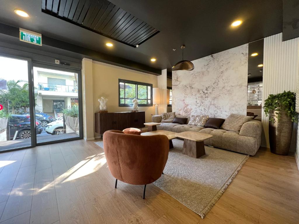 Χώρος καθιστικού στο Beer Garden Hotel