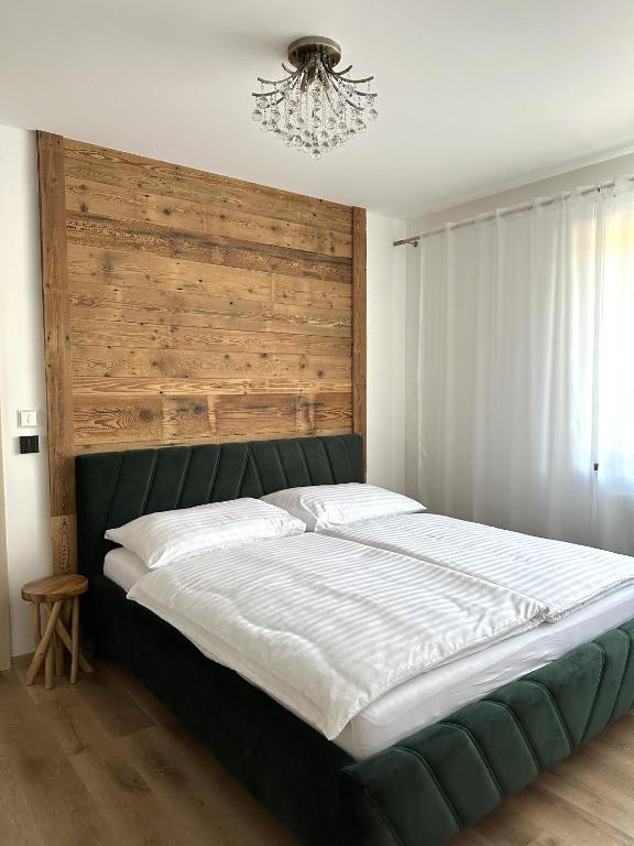 Postel nebo postele na pokoji v ubytování Apartmány Čerňák - Dolňák - 4-6 osob, terasa, grill, dvě parkovací místa
