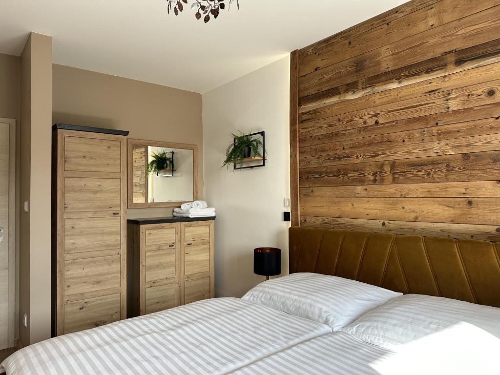 Postel nebo postele na pokoji v ubytování Apartmány Čerňák - Horňák - 4-6 osob, balkon, dvě parkovací místa