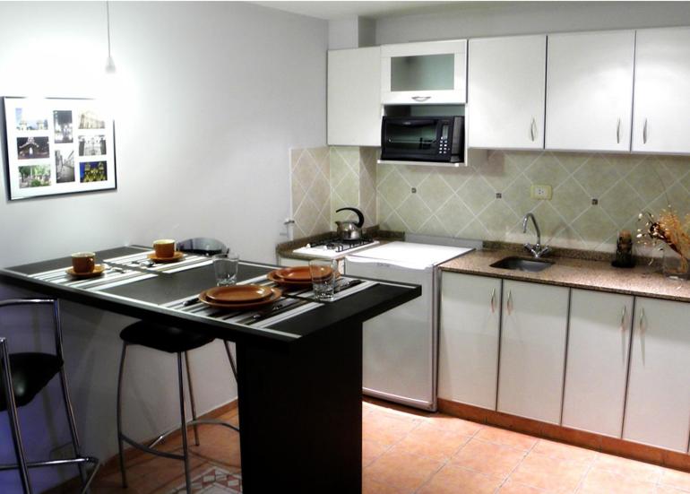 
A kitchen or kitchenette at Santiago Building Departamentos
