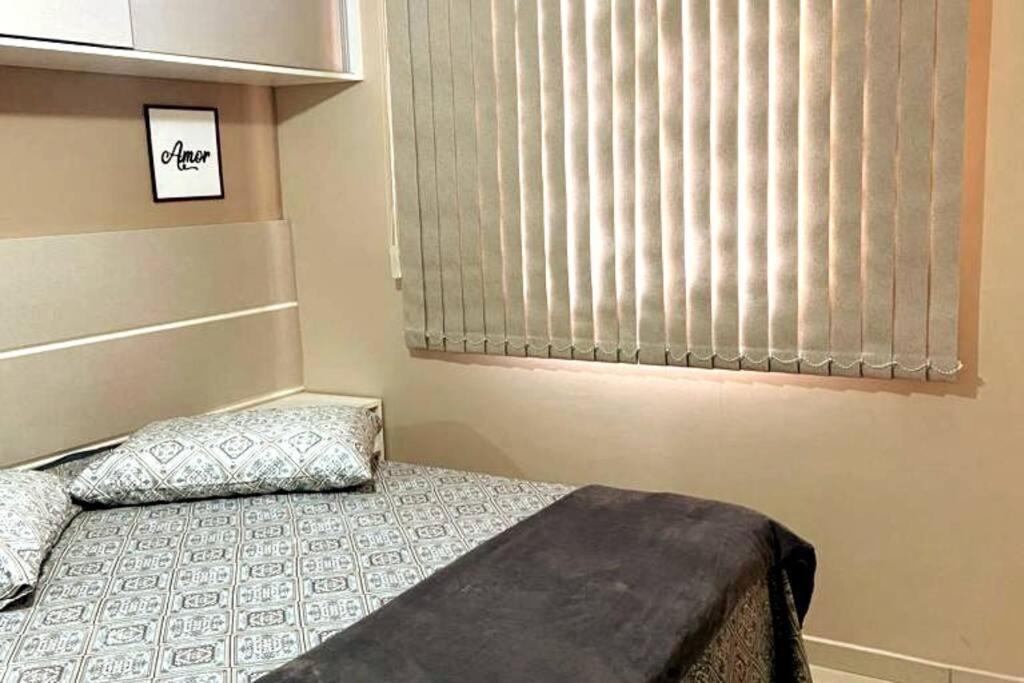 Uma cama ou camas num quarto em Apartamento Mari 7