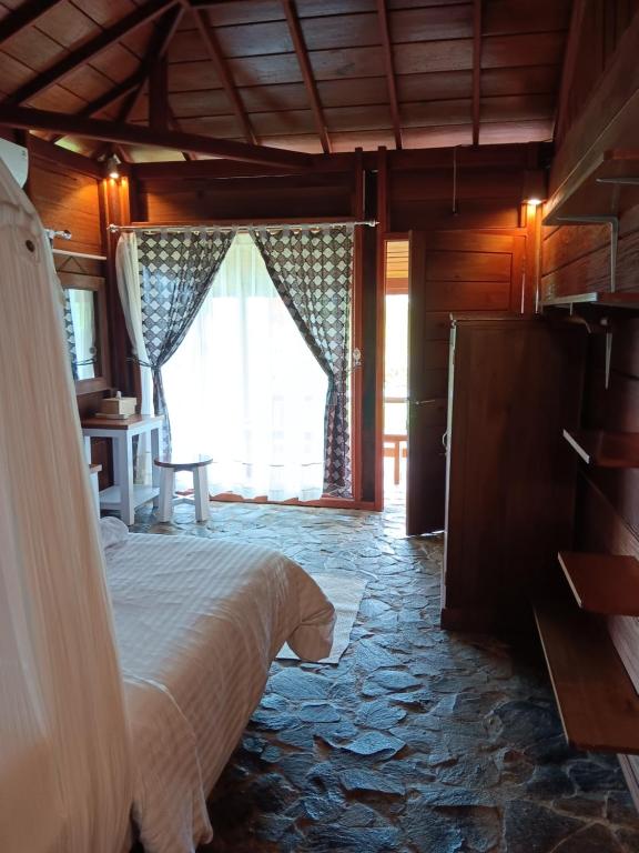 Postel nebo postele na pokoji v ubytování Oinan Guest House