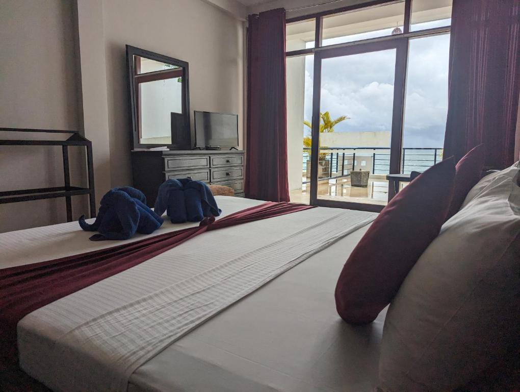Postel nebo postele na pokoji v ubytování Hotel Silan Mo