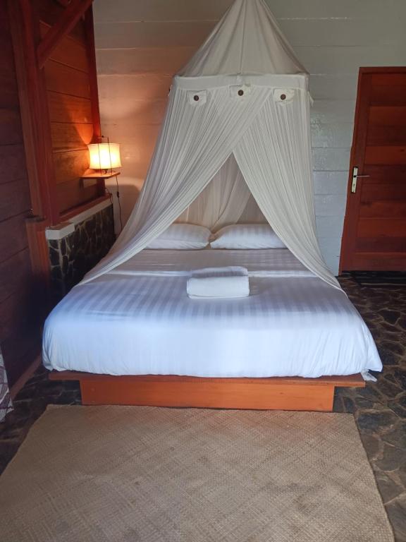 Postel nebo postele na pokoji v ubytování Oinan Guest House