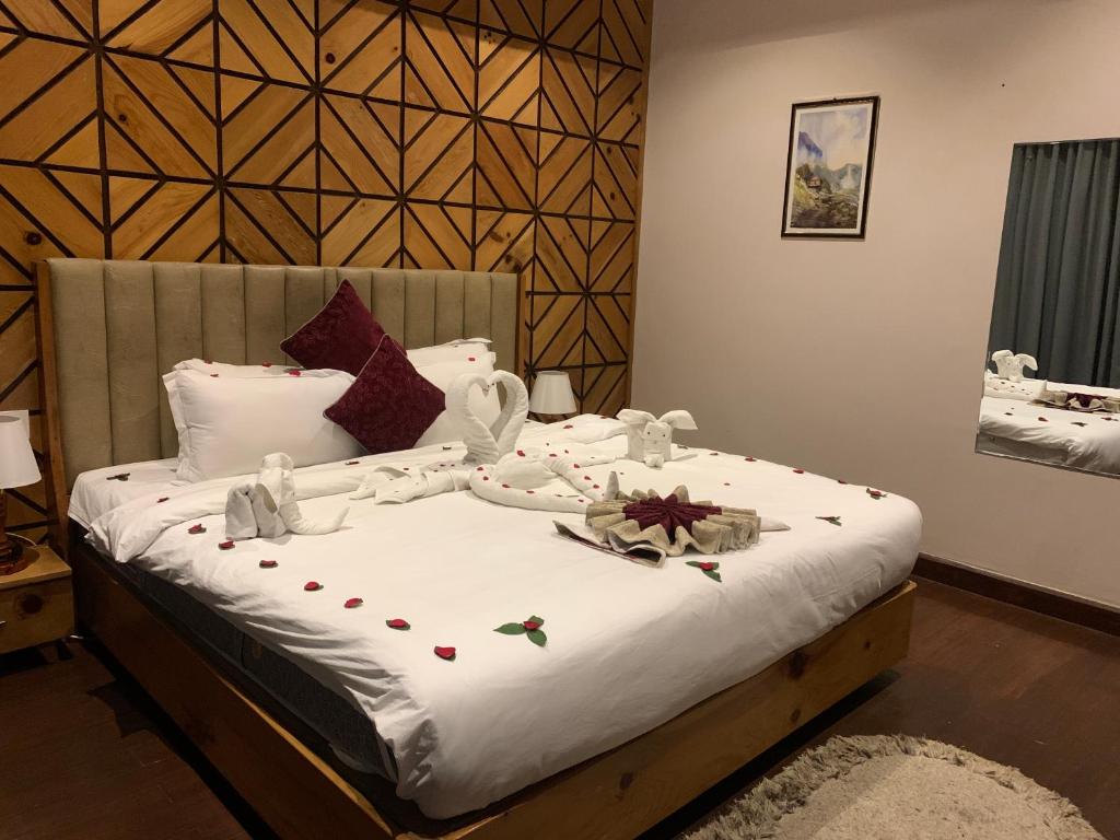 Voodi või voodid majutusasutuse Hotel Smarak toas