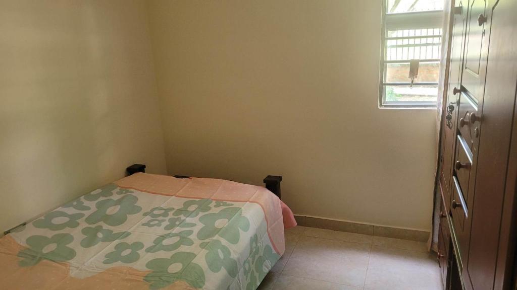 Postel nebo postele na pokoji v ubytování Tu apartamento