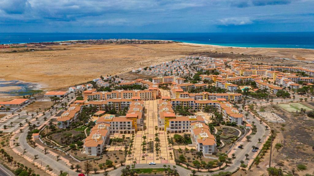 an aerial view of a resort near the beach at Sol & Lar No stress in Santa Maria