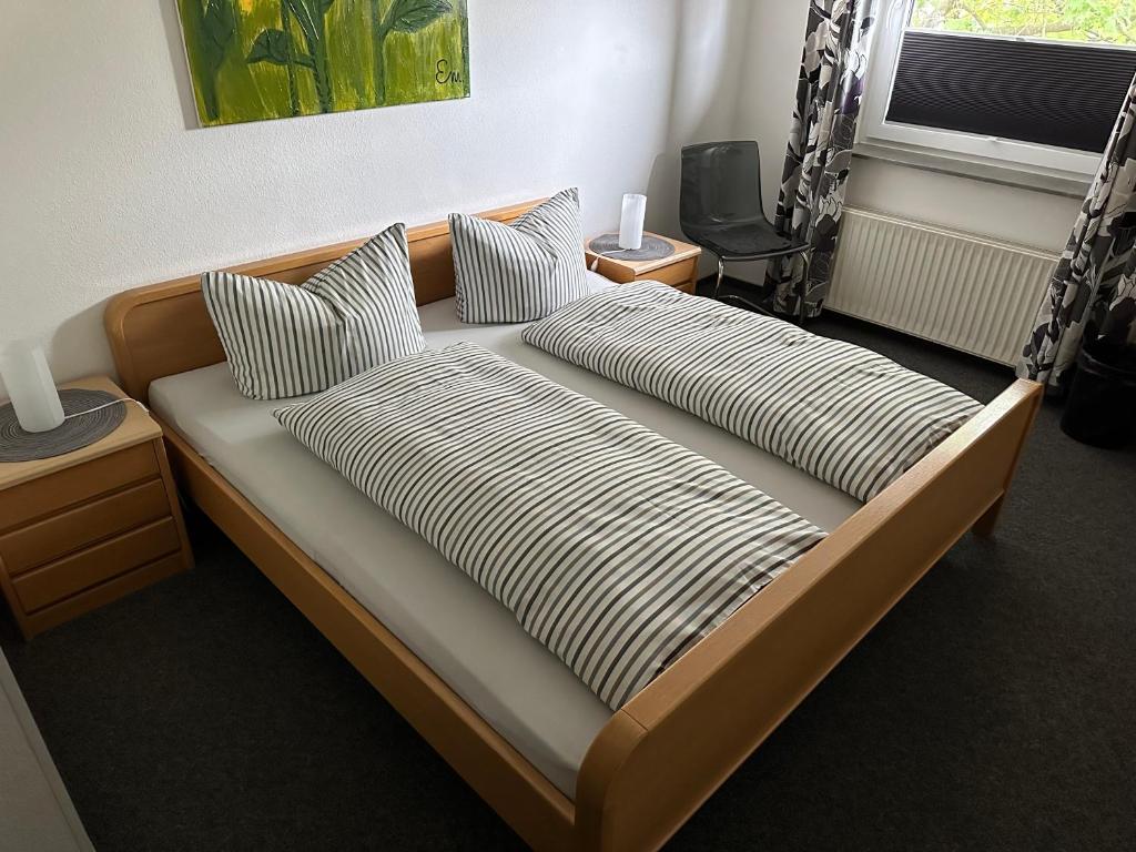 Postel nebo postele na pokoji v ubytování Gasthaus Unikat