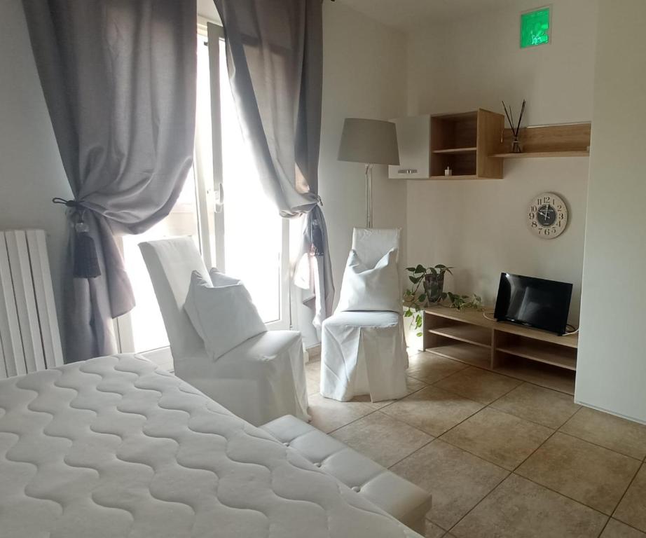 Ένα ή περισσότερα κρεβάτια σε δωμάτιο στο PUGLIA DISFIDA Apartment