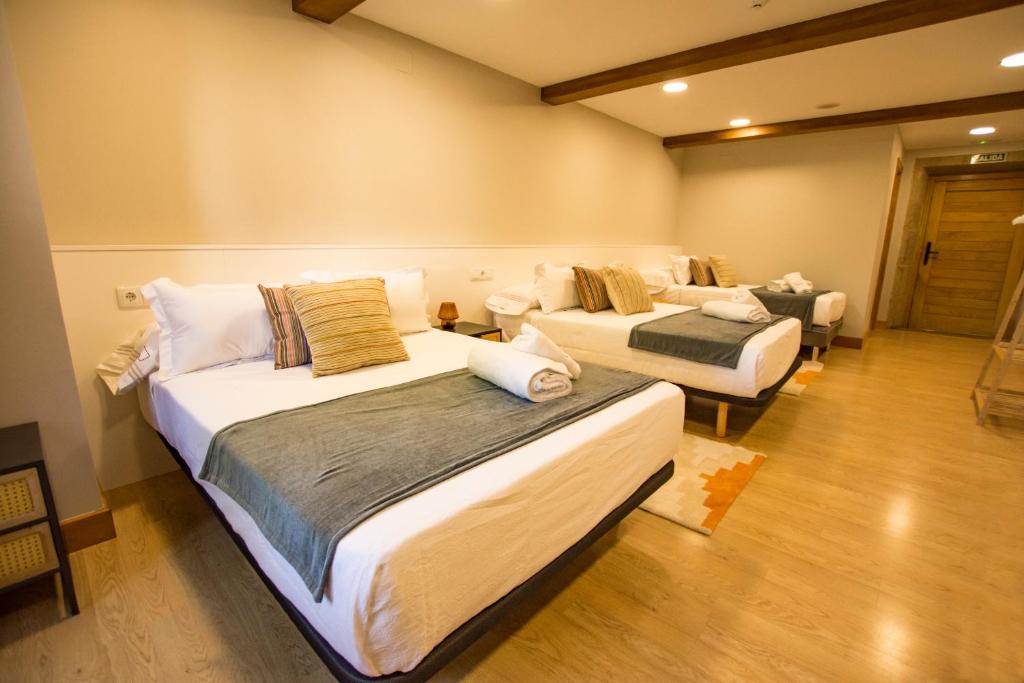 Postel nebo postele na pokoji v ubytování hostal Nomade Santiago
