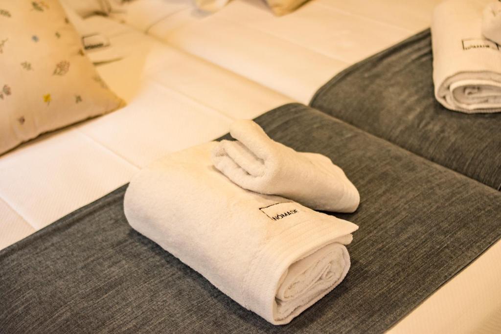 Postel nebo postele na pokoji v ubytování hostal Nomade Santiago