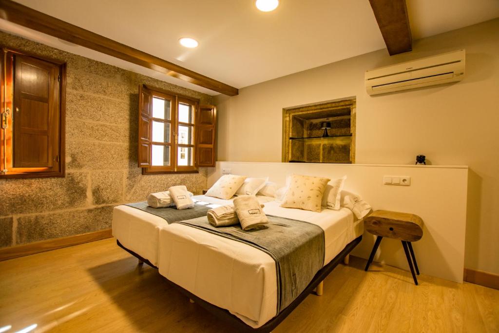 Postel nebo postele na pokoji v ubytování hostal Nomade Santiago