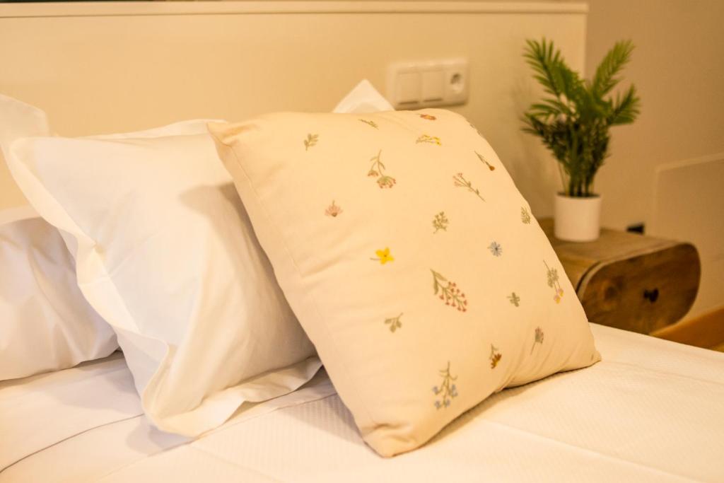 Postel nebo postele na pokoji v ubytování hostal Nomade Santiago