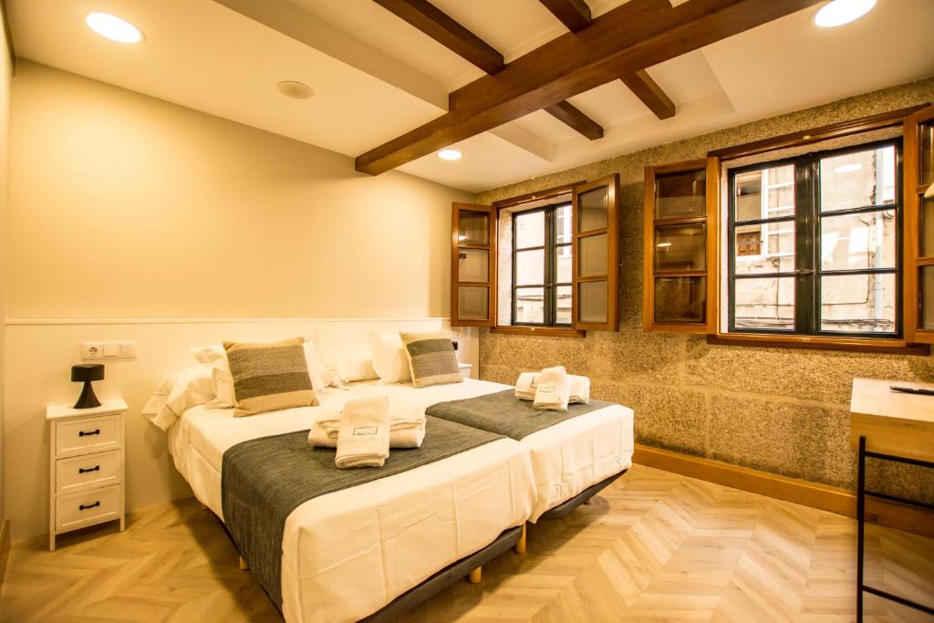 Postel nebo postele na pokoji v ubytování hostal Nomade Santiago