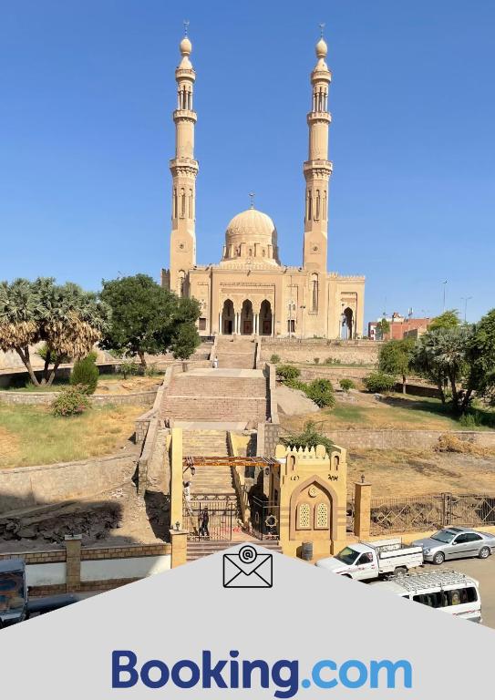 a view of a building with a mosque at Tabia Tower City center aswan in Aswan