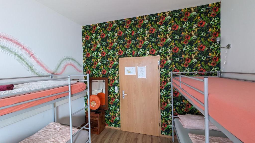 Postel nebo postele na pokoji v ubytování Hostel Très Schick