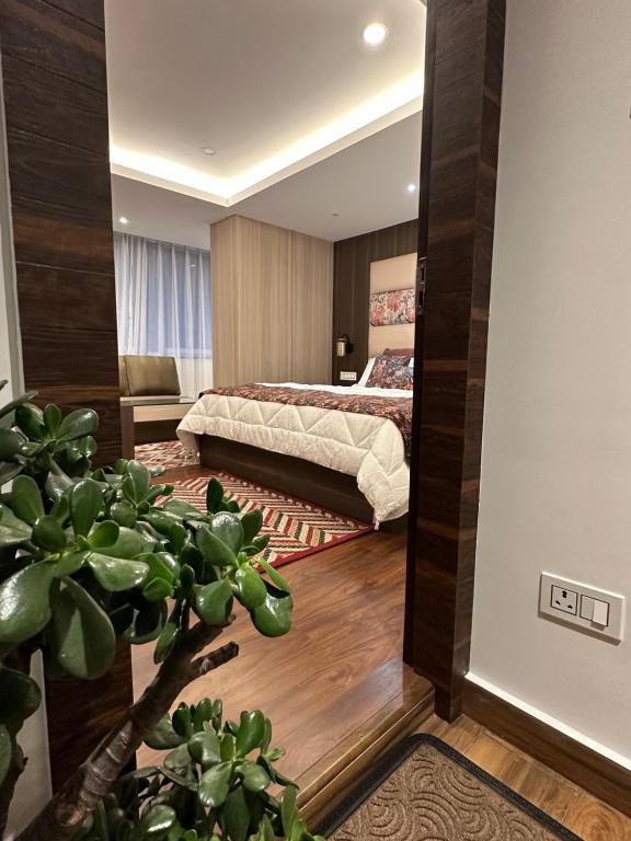 Postel nebo postele na pokoji v ubytování LASA HOMES