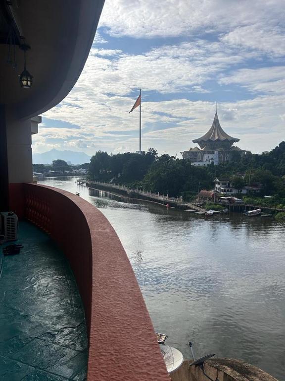 a view of a river from a bridge at Riverbank suites 405 in Kuching