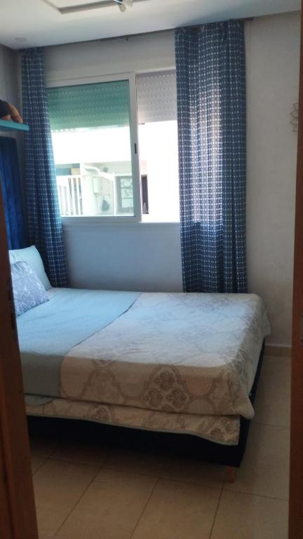 Postel nebo postele na pokoji v ubytování Chambre haut standing