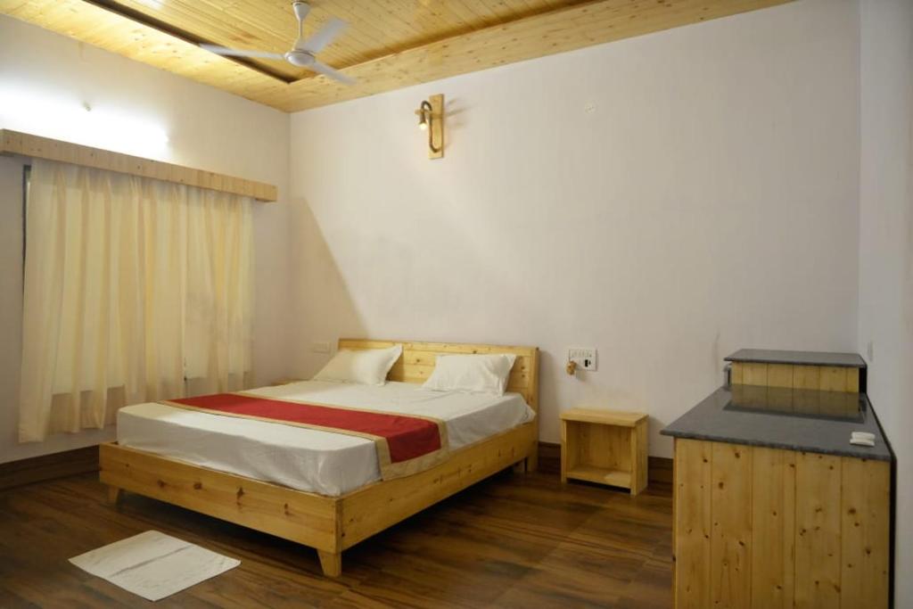 Postel nebo postele na pokoji v ubytování Gill Resort
