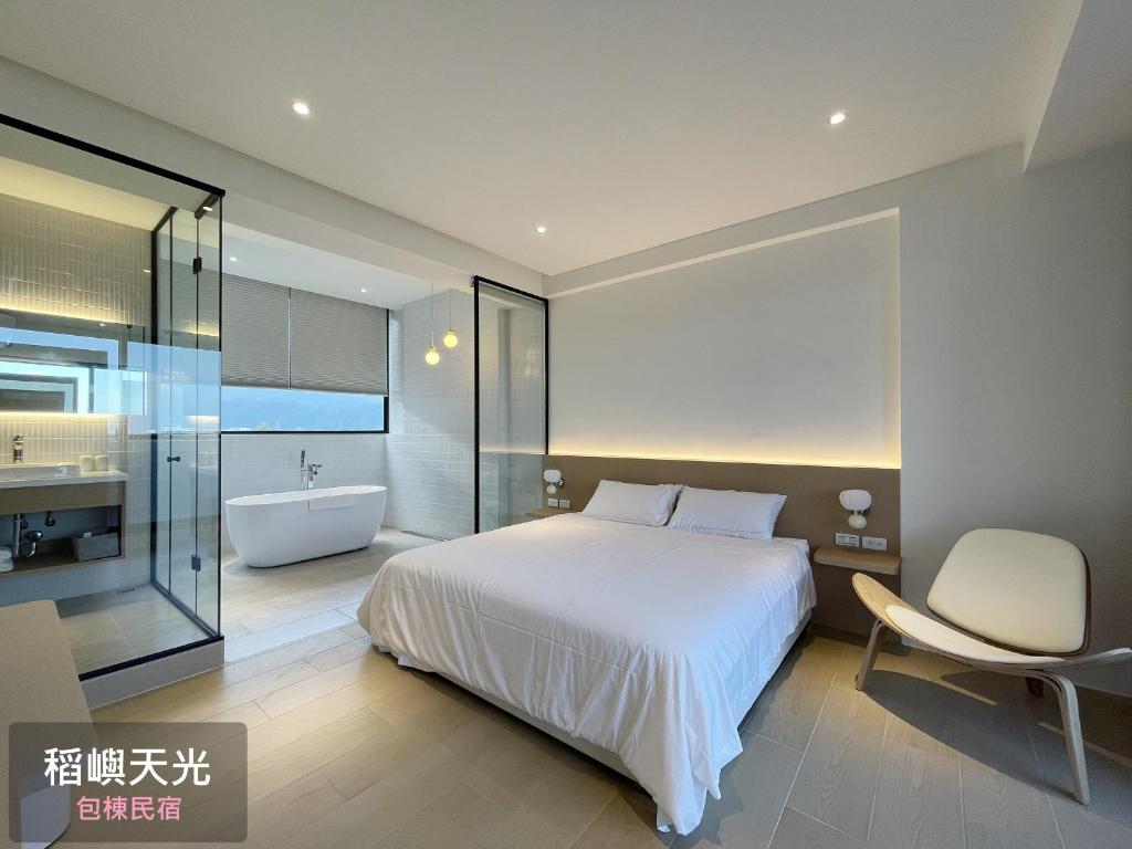 Letto o letti in una camera di 稻嶼天光包棟民宿
