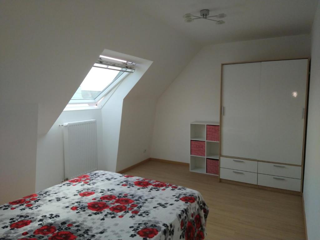 Postel nebo postele na pokoji v ubytování chambre d'hôte